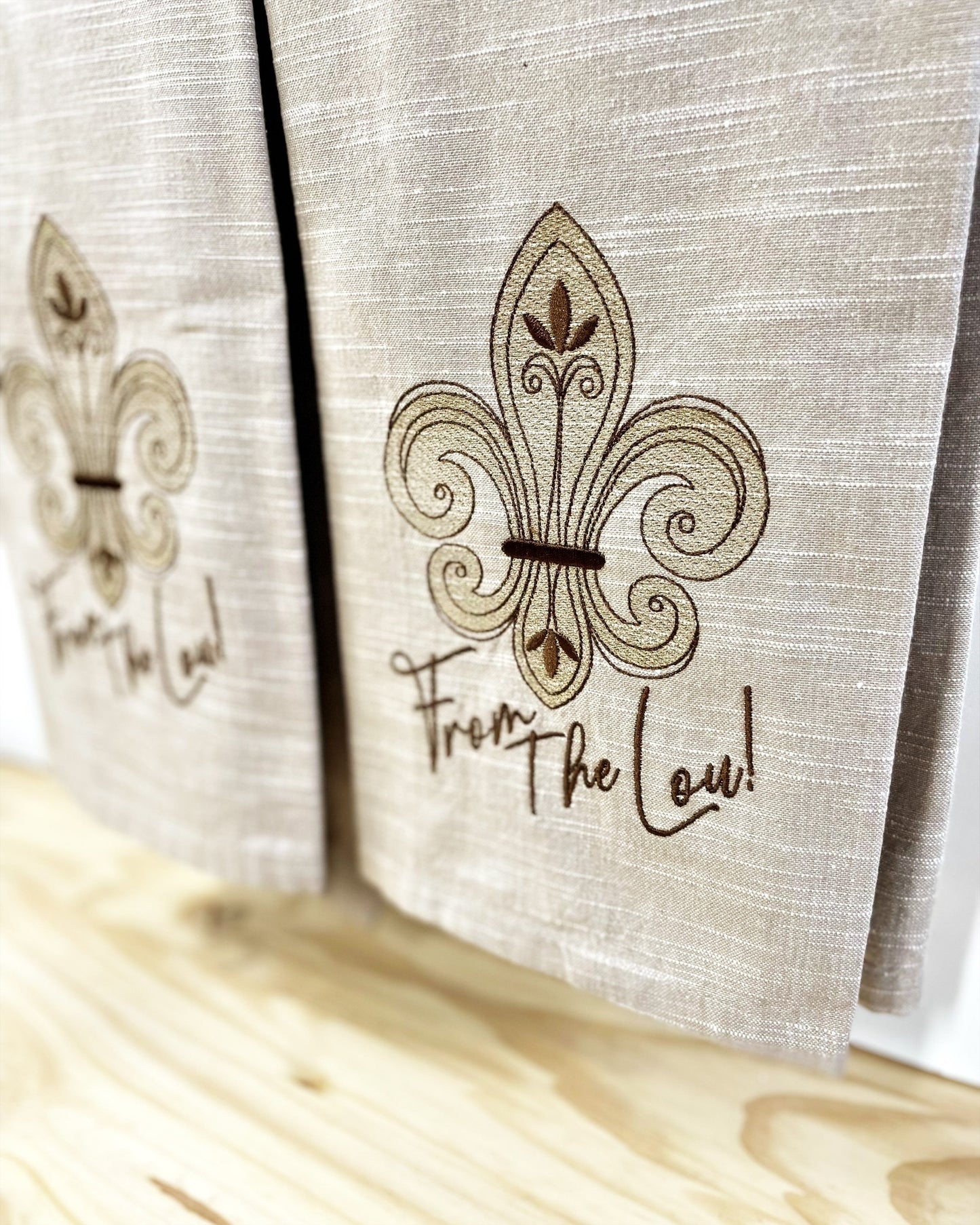 St. Louis themed Kitchen Towel, Embroidered Fleur De Lis, "From The Lou" on Beige/Tan Chambray